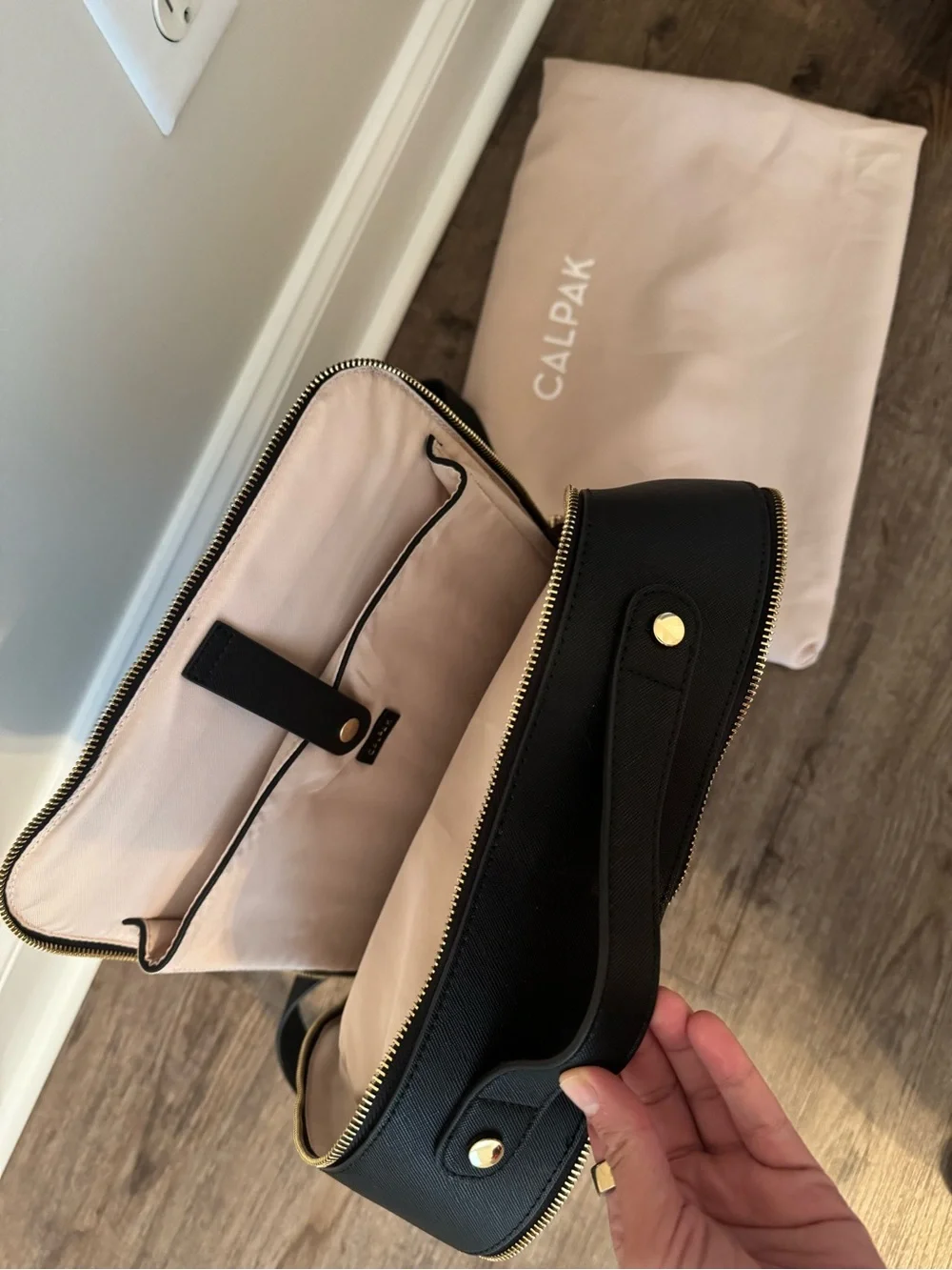 Calpak Black Backpack with Woven Trim and Gold Hardware